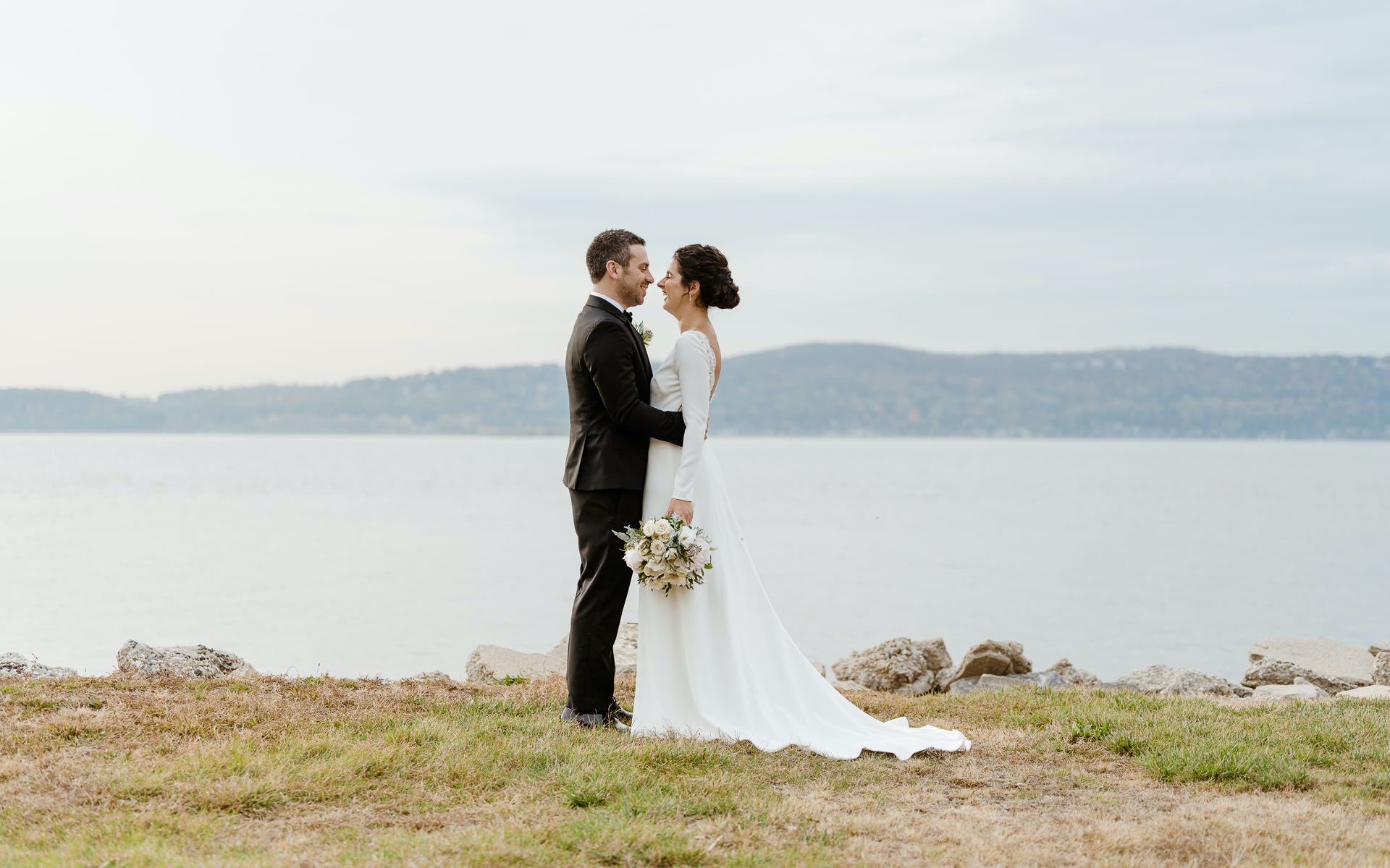 A couples first look on the Hudson river in Irvington New York with views of the Mario Cuomo bridge and the Rockland county coastline